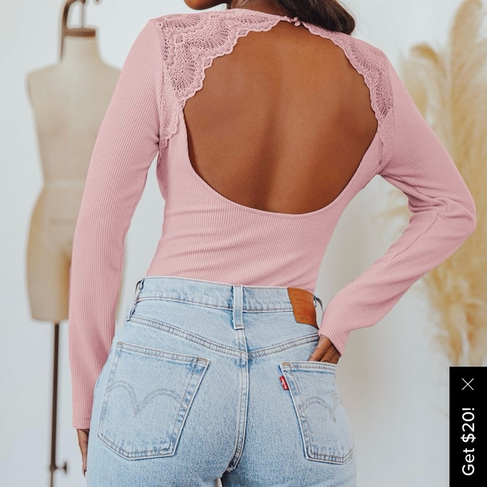 Worn once. Blush pink lace long sleeve backless bodysuit